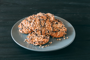 Chocolate chip cookies on dark old wooden table with place for text., freshly baked. Selective Focus with Copy space