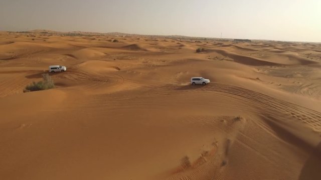 4K Aerial View Of Sports Cars Dune Bashing in Dubai
