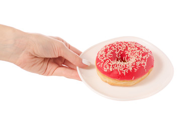 Plate with donuts in hand sweetness
