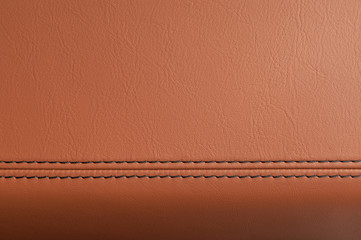 Fototapeta premium Car interior detail. Leather background with stich.