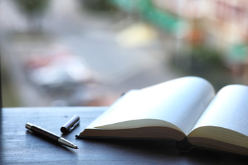 open book and a table