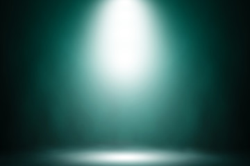 Blue spotlight smoke stage nightclub background.