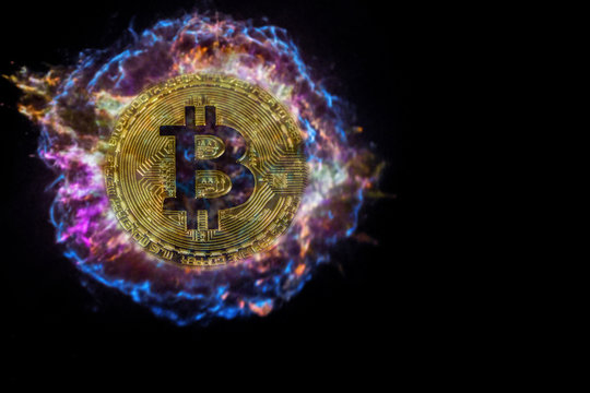 Gold coin of bitcoin explodes and flies into black space. Bitcoin burns, flying, falling. Elements of this image furnished by NASA.