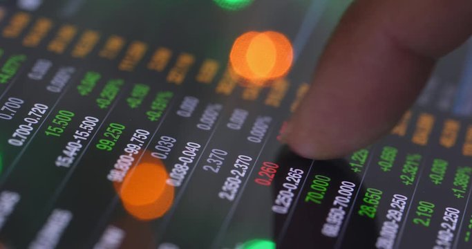 Graphs and data sheets on a digital touchscreen tablet device
