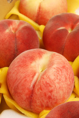 Fresh  peaches in the box ready for sale