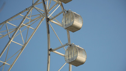 Ferris wheel in Manila, Mall of Asia. Ferris wheel against a blue sky. Philippines.