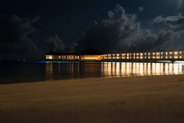 Island walkway at night