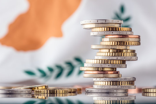National flag of cyprus and euro coins - concept. Euro coins. Euro money. Euro currency