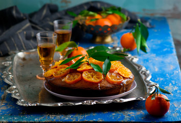 Madeira Cake with Caramelised Tangerines.selective focus