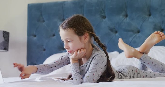 Happy girl using laptop 