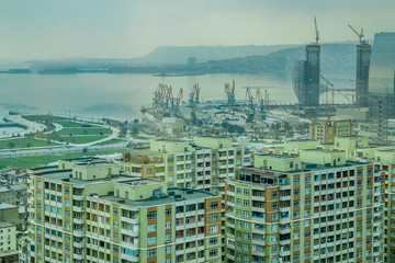 City view skyscrapers with dramatic cloudy sky background.