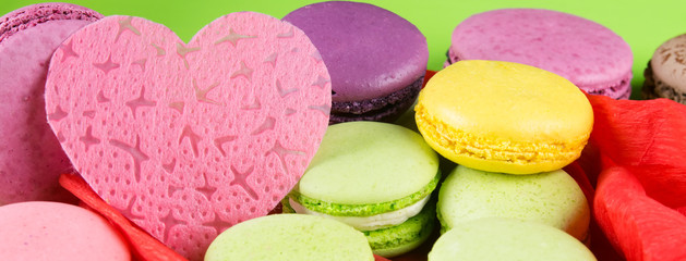 Fototapeta na wymiar background for all lovers, for the holiday of St. Valentine's Day, with a dessert macaron