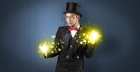 Illusionist holding superpower on his hand