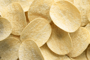Potato chips. Snack. Food texture, background. Close up.