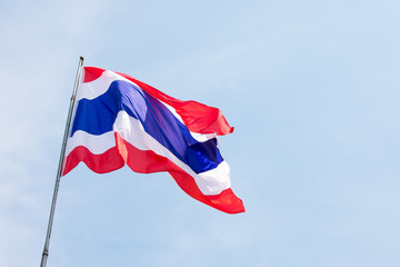 flag of thailand against a blue sky