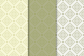 Set of geometric ornaments. Olive green and white seamless patterns