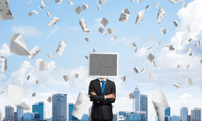 Businessman with monitor instead of head.