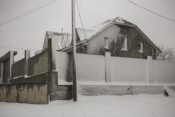 Snowstorm in the city. The Blizzard swept the house.