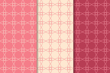 Cherry red geometric ornaments. Set of seamless patterns