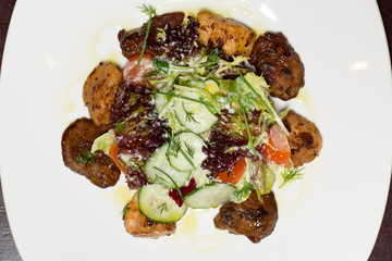 Chef s specialty presented in restaurant on served table