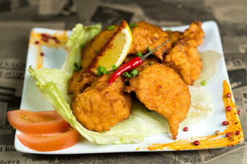 Chef s specialty presented in restaurant on served table