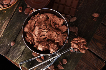 Chocolate ice cream scoop, scooped with a ice spoon