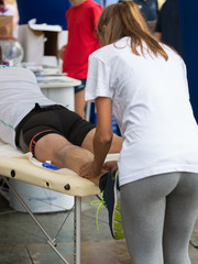 Athlete's Calf Muscles Massage after Sport Workout