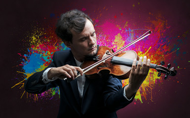 Composer with splotch and his violin