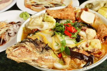 Fish head casserole on the table 