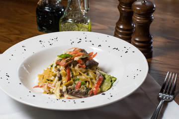 Chef s specialty presented in restaurant on served table