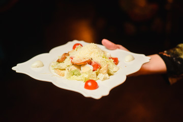 Chef s specialty presented in restaurant on served table