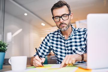 Web designer working from modern home office