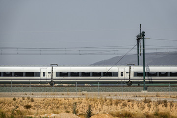 Railway and blurred train profile