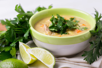 Indian Mulligatawny soup with lentil, parsley. Copyspace, horizontal view.