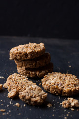 Homemade granola bar on a black background