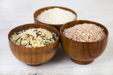 Three bowls with different varieties of rice