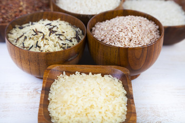 Fototapeta na wymiar Six bowls with different varieties of rice