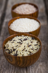 Three bowls with different varieties of rice