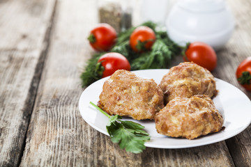 Delicious cutlets, tomatoes and parsley