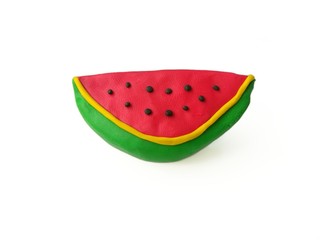 Colorful clay plasticine made are delicious watermelon slice on white background, cute fruit dough