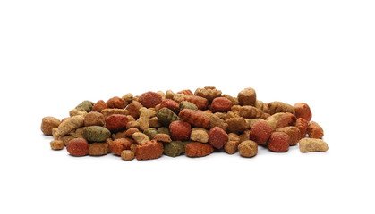 Dry colorful dog food isolated on white background