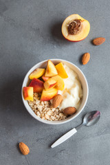 Fruit, granola and yogurt breakfast bowl