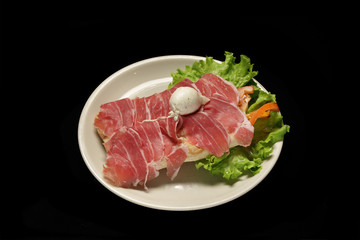 bruschetta bread with raw parma ham and mozzarella