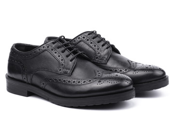 Black brogues. Isolated on a white background.