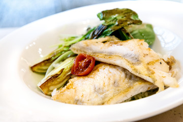 grilled seafood and vegetables-french cuisine dish with many vegetables