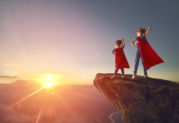 children are playing superhero © Konstantin Yuganov