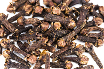 clove spices isolated on white background, close-up