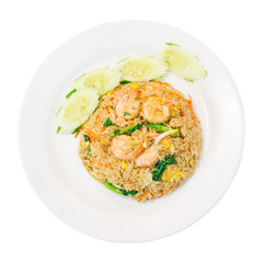 Top view, Shrimp fried rice with cucumber,Chinese kale in white plate,Thai food, Isolated white background