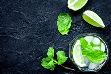 making mojito on dark background top view