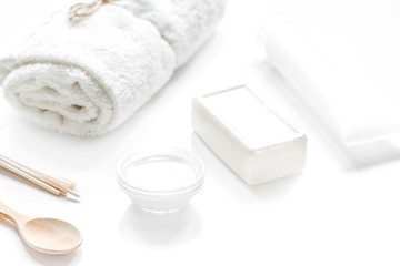 Fototapeta na wymiar body care concept with white set of cosmetics woman desk top vie